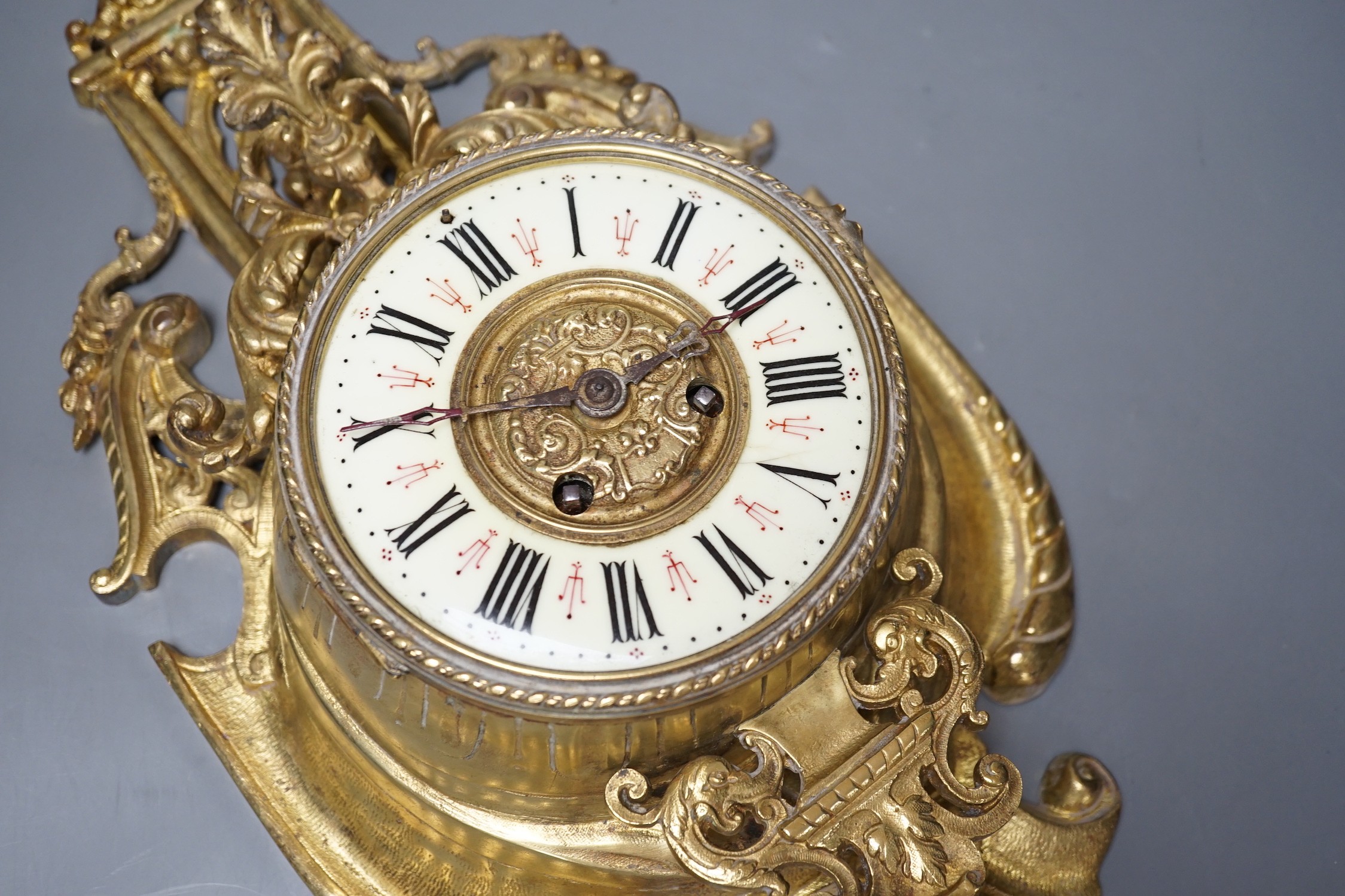 A French Rococo style ormolu wall clock, 55cm